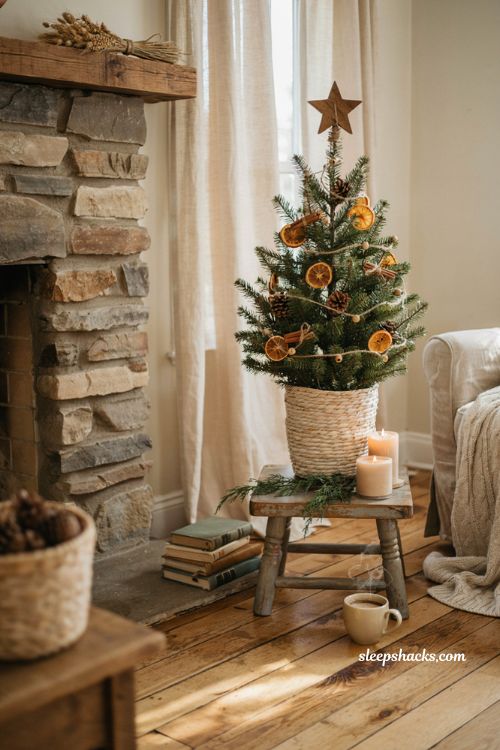 Dollar tree mini christmas tree ideas with rustic twine wrapped decor and dried orange slices