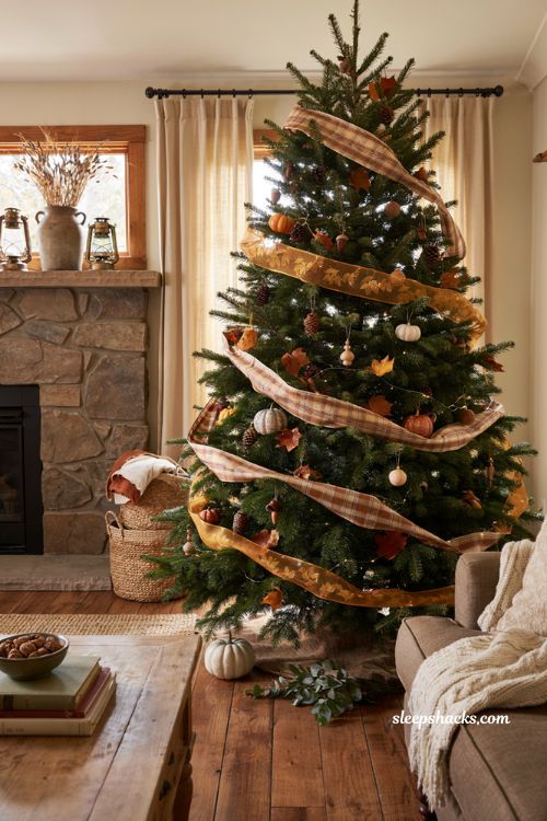 Fall christmas tree ideas with double plaid and leaf ribbon wrap in a cozy farmhouse living room