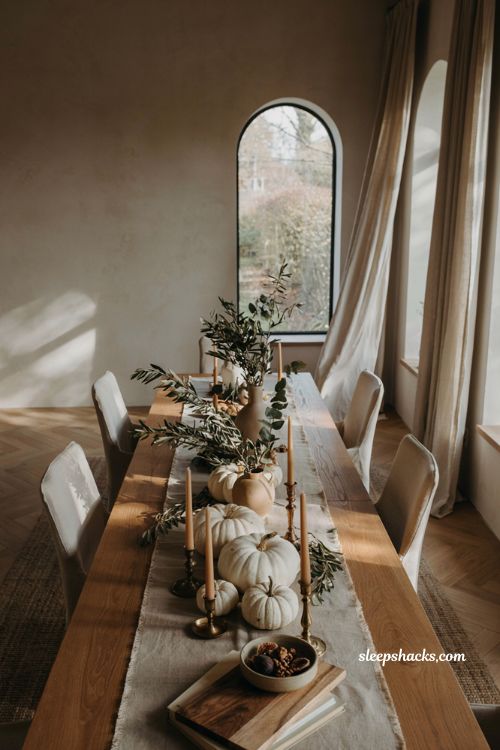 Fall home decor ideas with neutral white pumpkins and elegant autumn tablescape