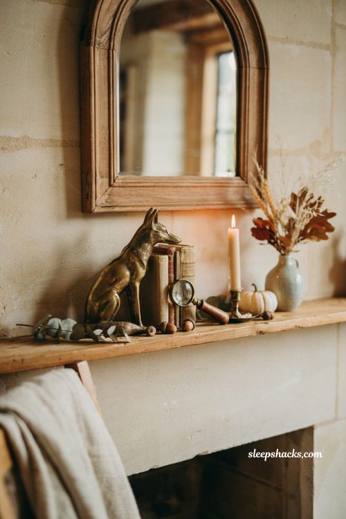 Fall mantle decor with vintage brass animal figurine and cozy farmhouse fireplace styling