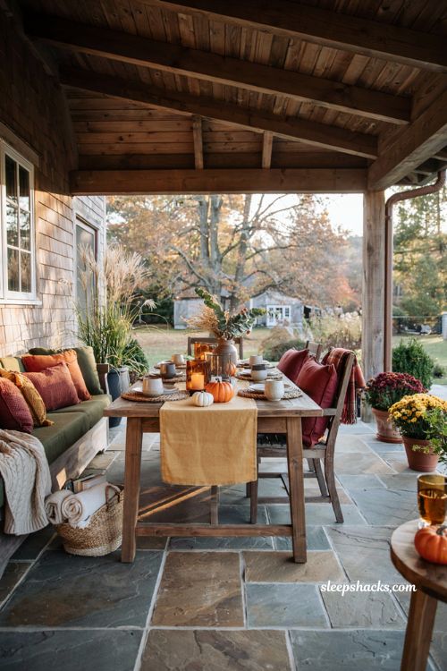 Fall patio decor with autumn pillows and cozy seasonal textiles