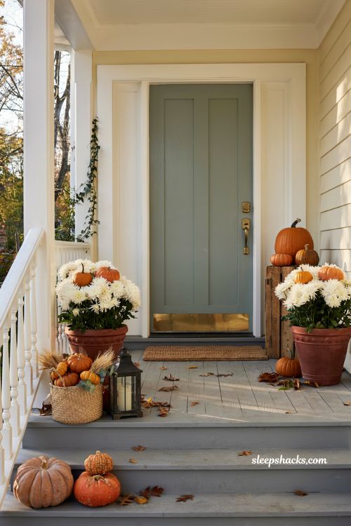 Front porch pumpkins display ideas using a mix of real and faux pumpkins