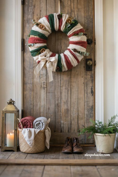 Handmade sweater wrapped christmas wreath with rustic cozy farmhouse holiday decor