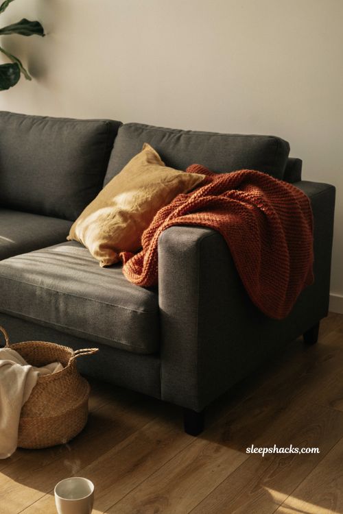 How to drape a chunky knit throw over sofa arm for fall living room decor