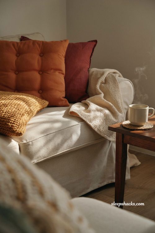 How to swap fall pillow covers on a neutral sofa for easy cozy room decor