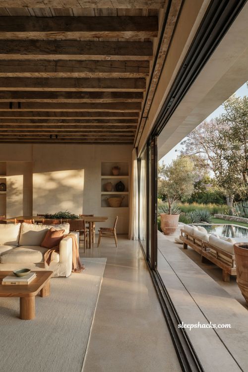 Mexican minimalist decor ideas with open plan living flowing into a covered patio