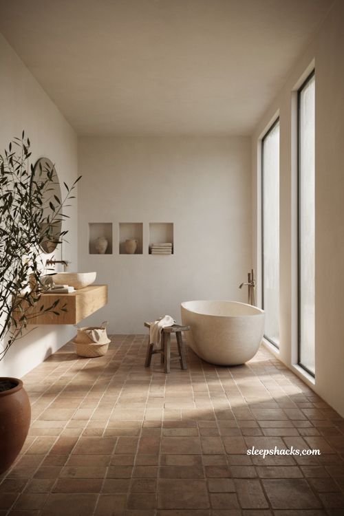 Mexican minimalist decor ideas with terracotta floor tiles and warm neutral bathroom