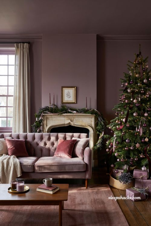 Monochromatic purple Christmas living room decor idea expanding existing palette with aubergine mauve and plum accents