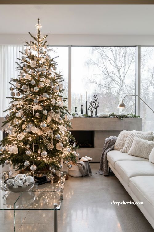 Monochrome silver and white Christmas living room decor color scheme idea for modern and contemporary spaces