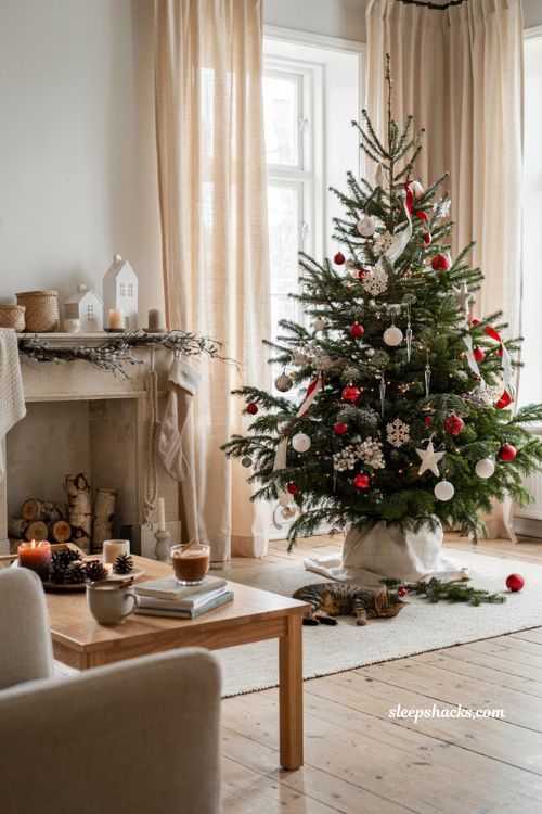 Nordic frost red and white Christmas tree with frosted ornaments and Scandinavian holiday styling 