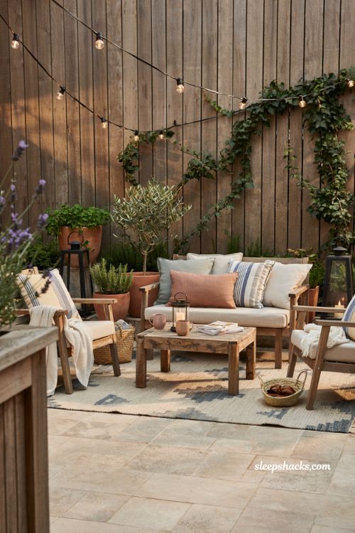 Patio decorating ideas on a budget with painted concrete floor and diy outdoor makeover