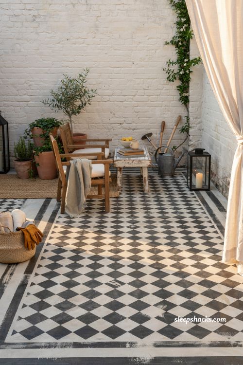 Patio decorating ideas on a budget with painted concrete floor and diy outdoor makeover