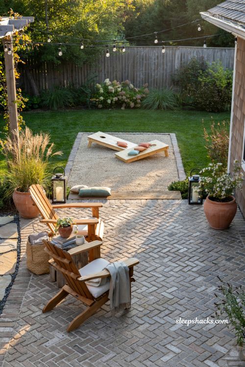 Paver patio ideas on a budget with backyard game zone and framed outdoor recreation area