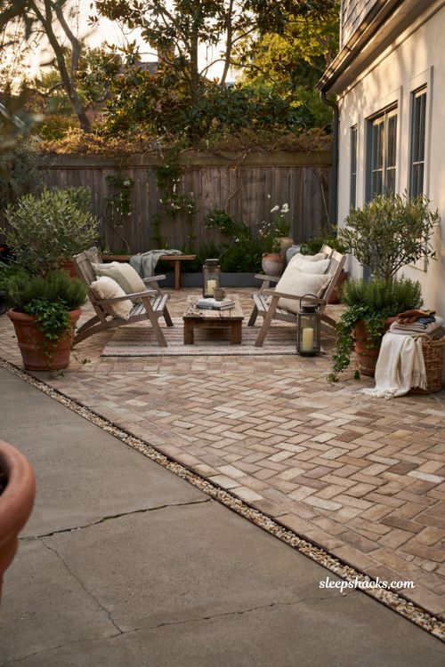 Paver patio ideas on a budget with herringbone patio extension and cozy outdoor living