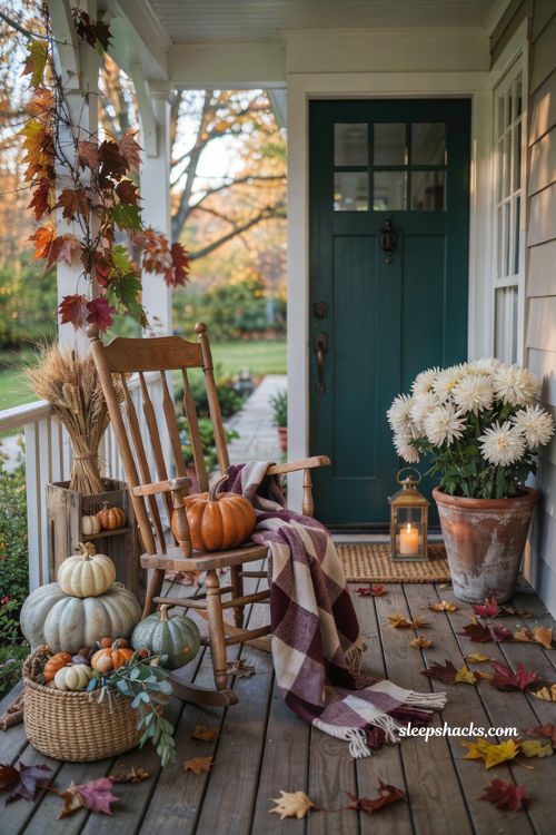 Pumpkin porch decor with a plaid throw blanket on a cozy rocking chair