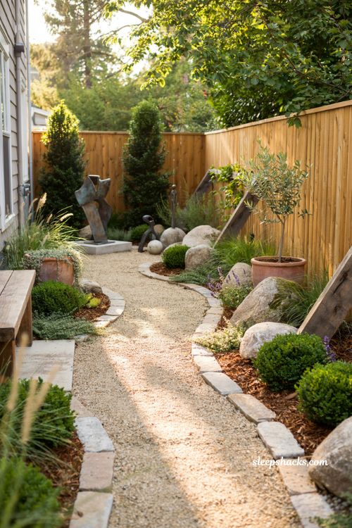 Side yard landscaping ideas with outdoor sculpture garden and modern cottage gravel pathway