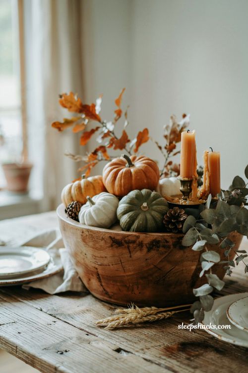 Simple diy fall farmhouse dough bowl centerpiece with white pumpkins and pinecones