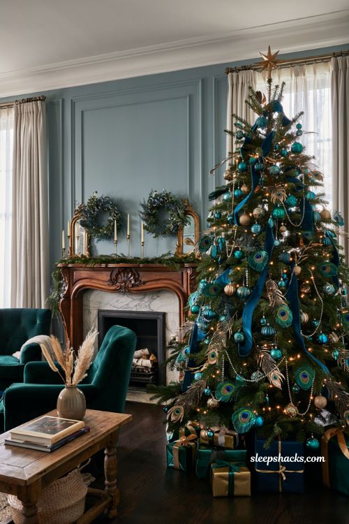 Themed christmas tree ideas with elegant peacock inspired blue green and gold holiday decor
