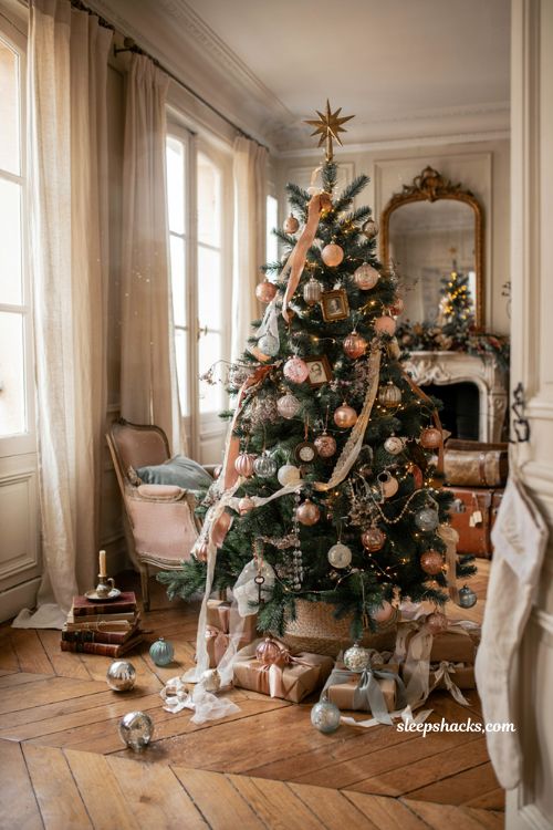 Themed christmas tree ideas with vintage French nostalgia decor and heirloom ornaments on a blue spruce tree