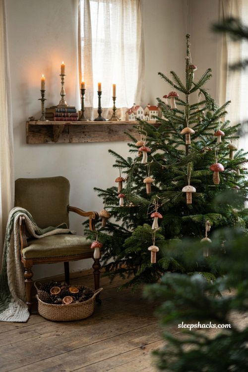 Vintage brass candlestick christmas card display on a rustic farmhouse holiday mantel