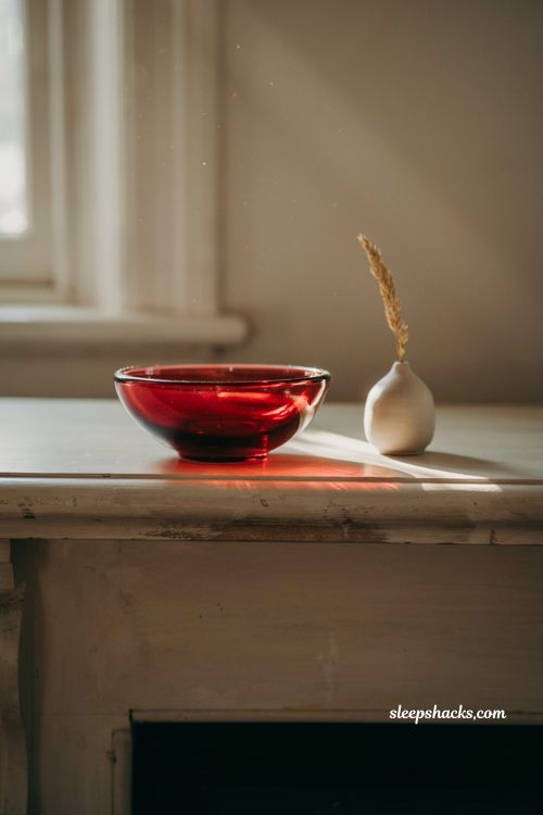 Vintage cranberry glass bowl as a statement fall mantel decor piece