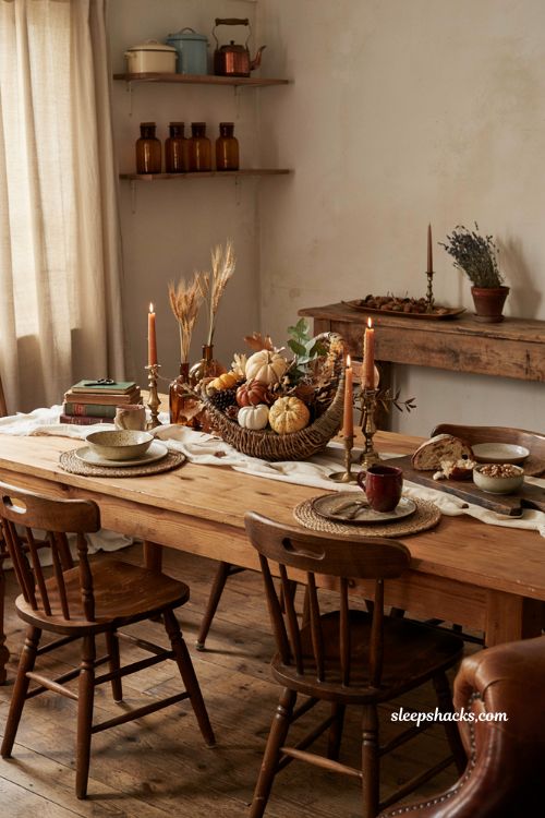 Vintage fall decor ideas with a woven cornucopia centerpiece on a cozy farmhouse harvest table