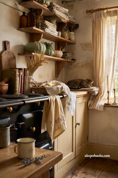 Vintage fall decor ideas with hand embroidered tea towels in a cozy farmhouse kitchen