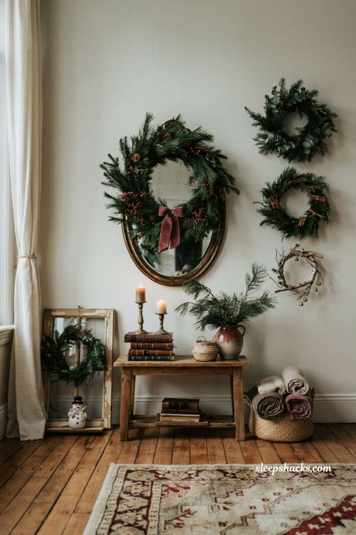 christmas wreath wall decor ideas for living room with mirrors vintage frames and greenery