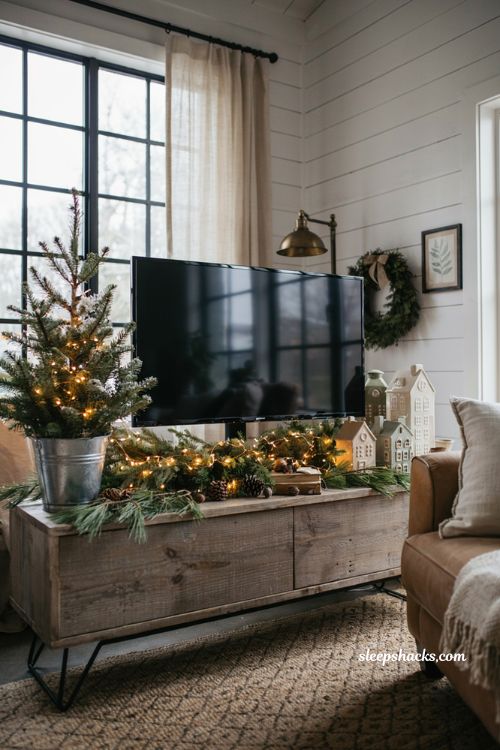 cozy christmas decor ideas for living room tv stand with galvanized bucket and garland