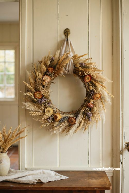 dried wheat and strawflower fall wreath for cozy textured home decor