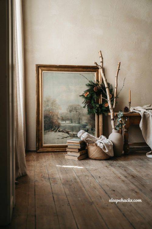 leaning christmas wall decor ideas with oversized winter art and cozy holiday accents
