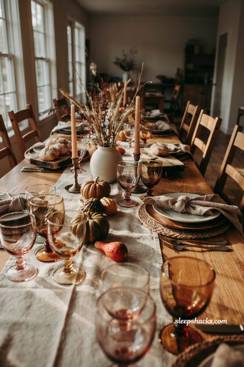 Amber goblets and vintage glassware for a warm Thanksgiving table setting