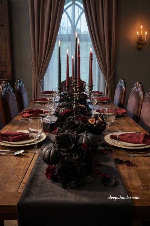 Black rose and candelabra tablescape for elegant gothic Halloween party decor