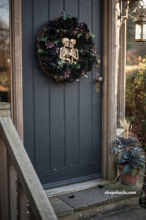 Black rose skeleton wreath romantic spooky Halloween front door decor