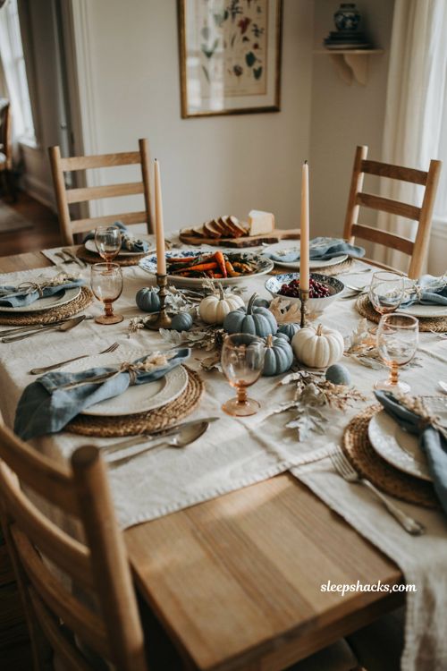 Blue and white pumpkin Thanksgiving table setting with cozy cottage decor