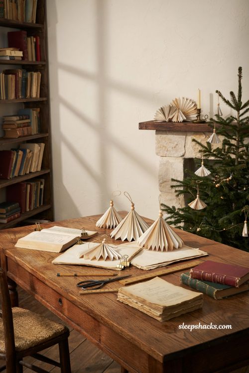Book page Christmas ornaments craft for kids with vintage paper and accordion folds