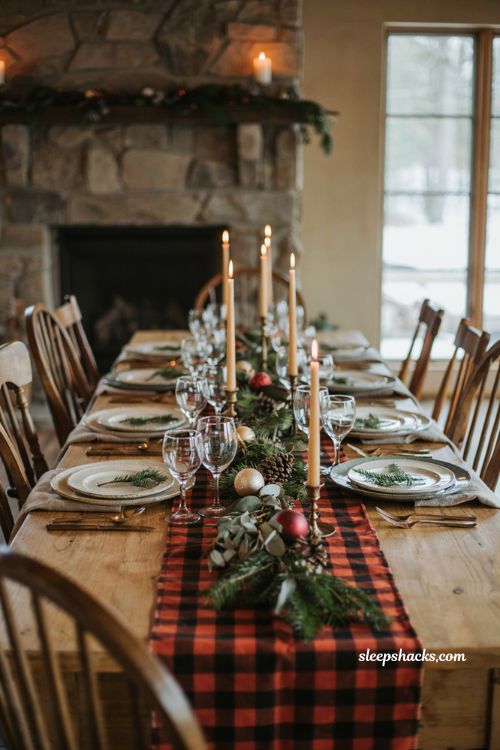 Buffalo plaid Christmas table linens with rustic stoneware and greenery