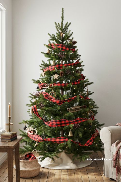 Buffalo plaid Christmas tree with farmhouse wooden and metal ornaments
