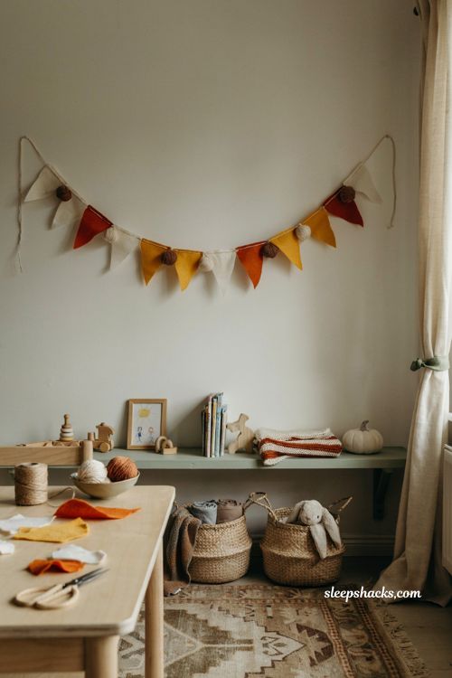 Candy corn fall bunting with felt triangles and yarn pom poms