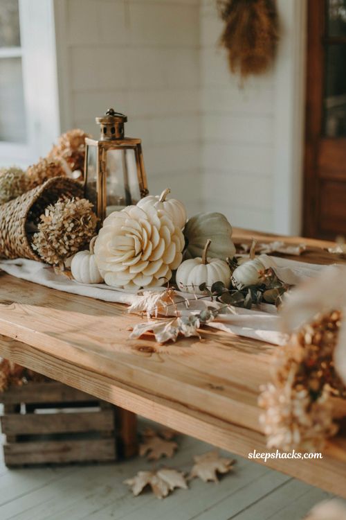 Carved flower pumpkin idea using a white heirloom pumpkin for elegant fall porch decor