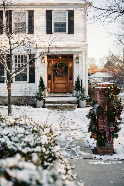 Christmas mailbox decor with evergreen garland matching front porch wreath