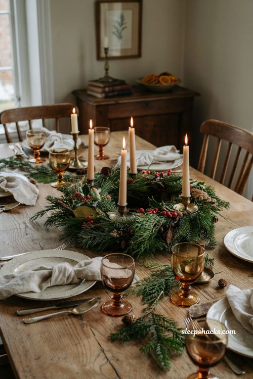 Christmas tablescape with advent wreath centerpiece evergreen greenery and candles