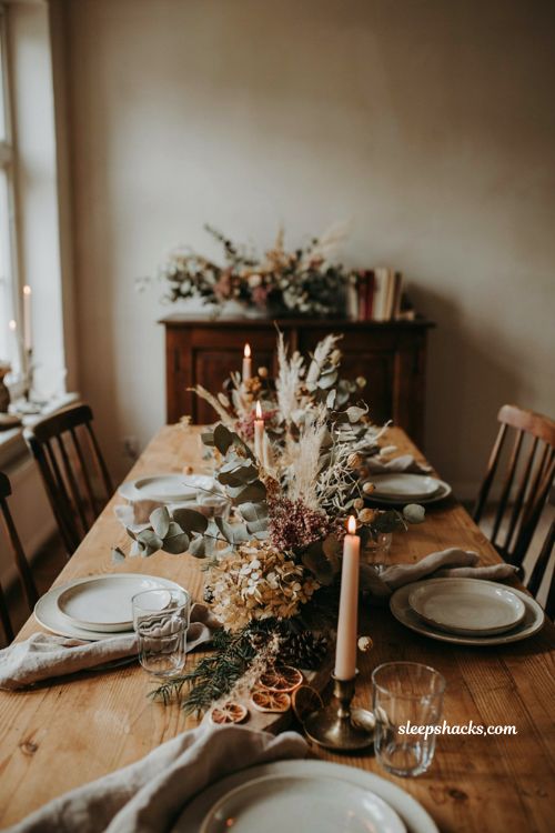Christmas tablescape with dried eucalyptus flowers dusty rose and sage accents
