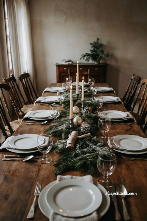 Christmas tablescape with frosted winter white decor silver accents and candles