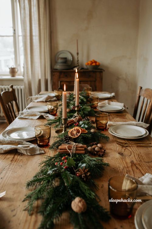 Christmas tablescape with star anise nutmeg cinnamon sticks and candlelight