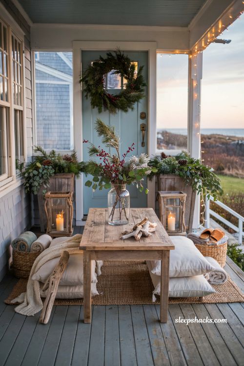 Coastal christmas porch decor ideas with cranberry stems eucalyptus and flocked pine