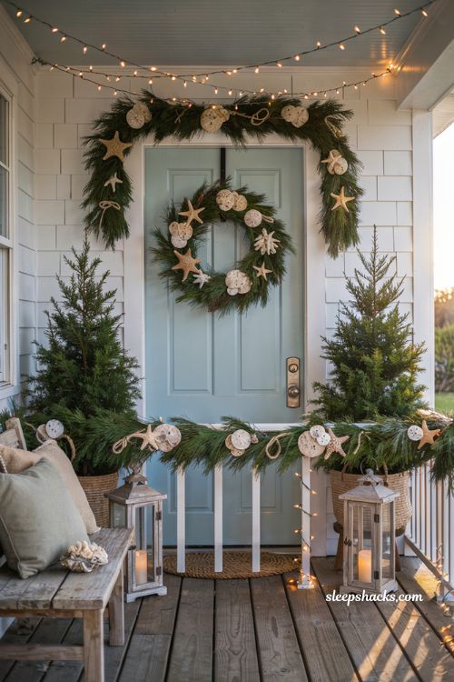 Coastal christmas porch decor ideas with sand dollar and starfish garland accents