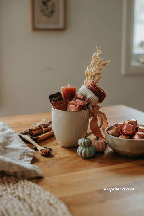 Coffee mug boo basket ideas with hot cocoa chocolate and cozy fall gifts
