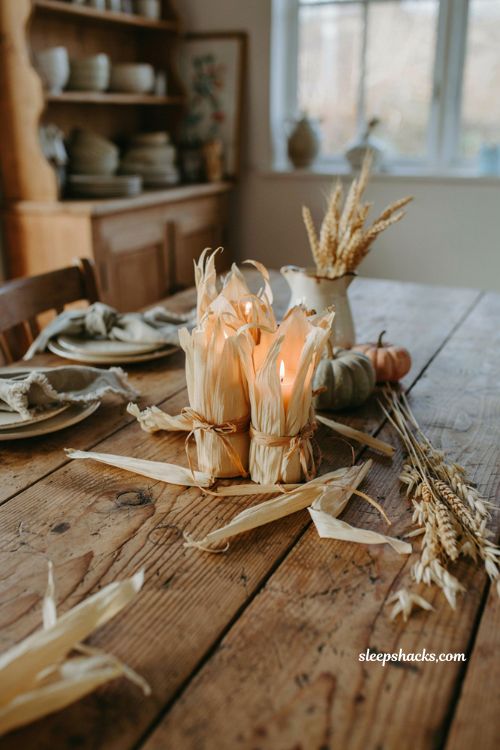 Corn husk wrapped candle holders for rustic fall table decor 