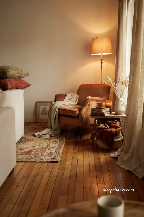 Cozy fall reading corner ideas with warm lighting and layered autumn textures
